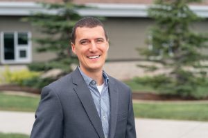 2022 Professional Headshot Of Bennett Uhler.